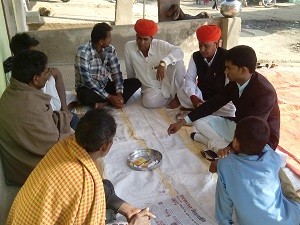 सूरजपुरा मे अभाव अभियोग सुनते सरवाड प्रधान किशन बैरवा।